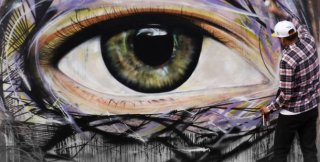 Уличный художник Луис Севен Мартинс